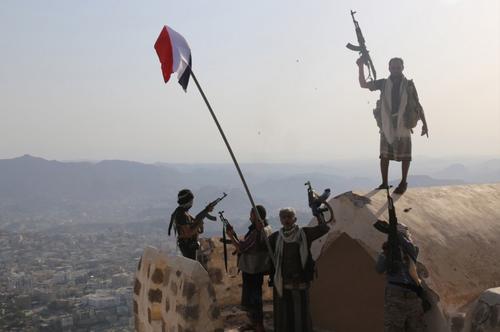 Fighters loyal to Yemen’s exiled president, Abedrabbo Mansour Hadi, stand on top of the al-Qahira Castle, located on the highest mountain in Yemen’s third city Taez, after they seized it from rebel fighters on Aug. 18. (AFP/Getty Images)
